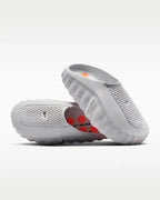 Nike Mind 001 Light Smoke Grey — sneaker gris fumé clair vue face