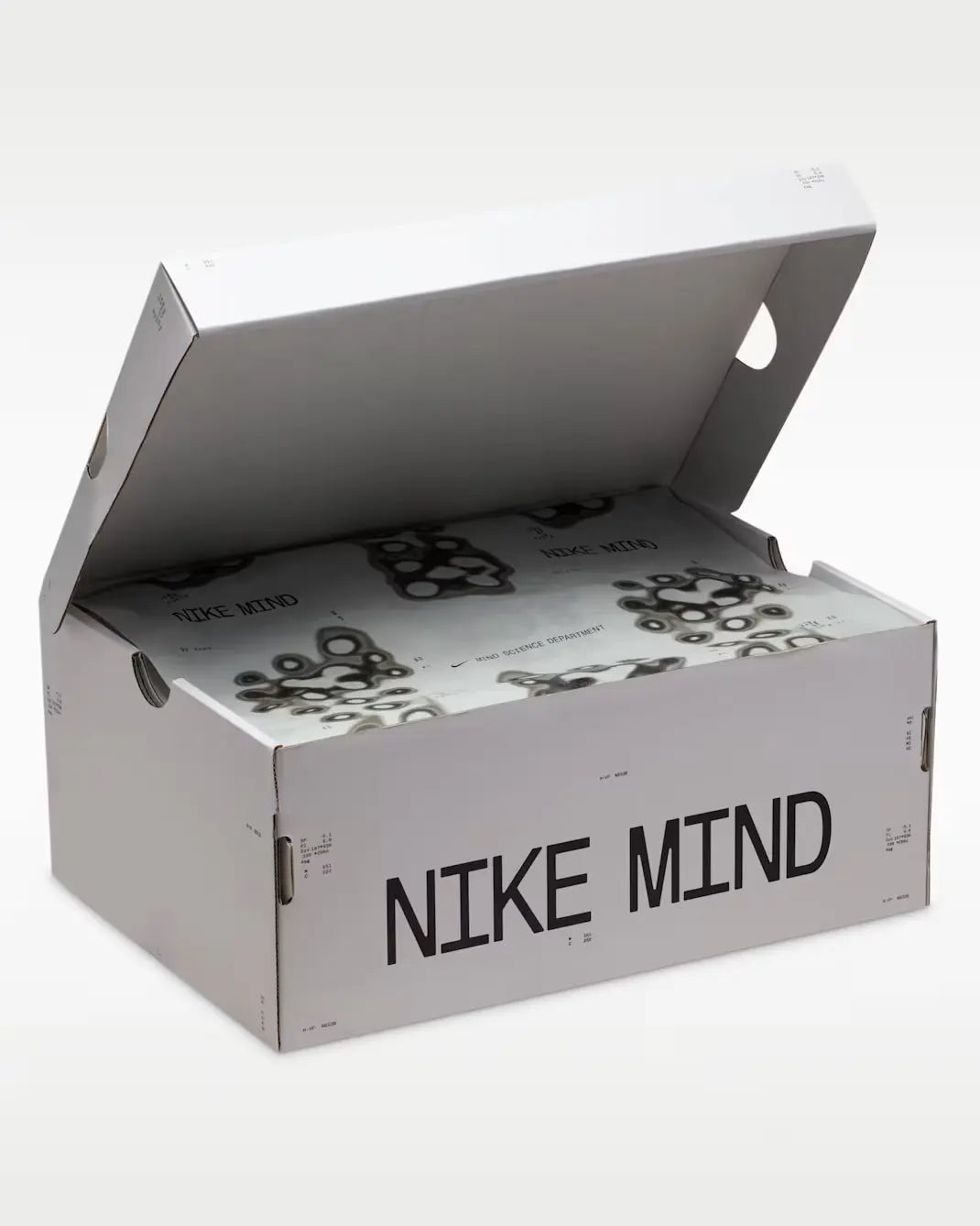 Nike Mind 001 Noir Hyper Cramoisi — détail laçage grands nœuds signature